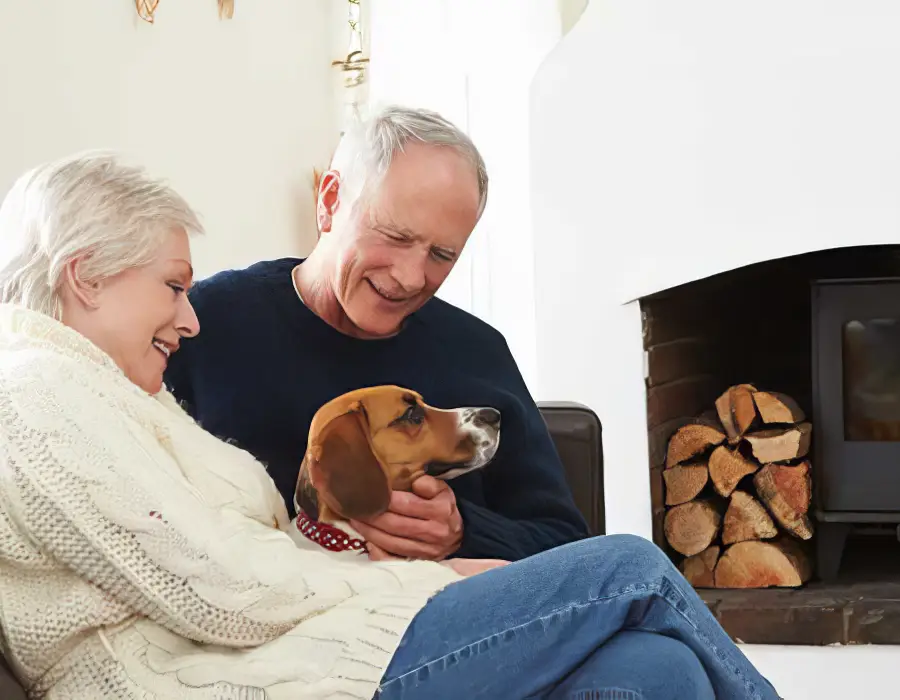 Couple sitting with their dog