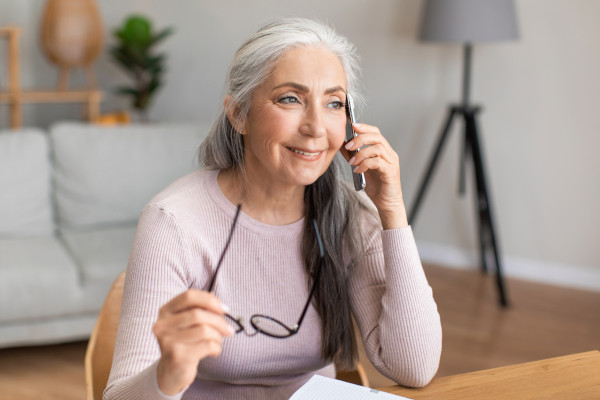 Senior woman on the phone scheduling an appointment