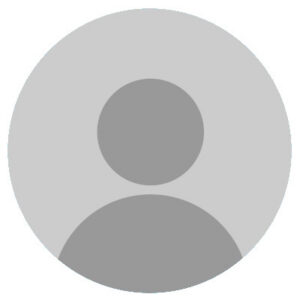 Gray placeholder image representing a headshot, featuring a circular silhouette of a person.